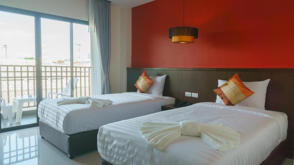 Postel nebo postele na pokoji v ubytování VISA Hotel Hua Hin - SHA Plus