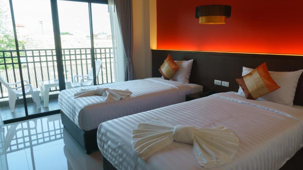 Postel nebo postele na pokoji v ubytování VISA Hotel Hua Hin - SHA Plus