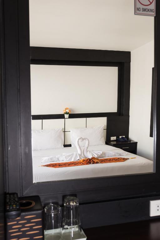 Postel nebo postele na pokoji v ubytování Star House Patong