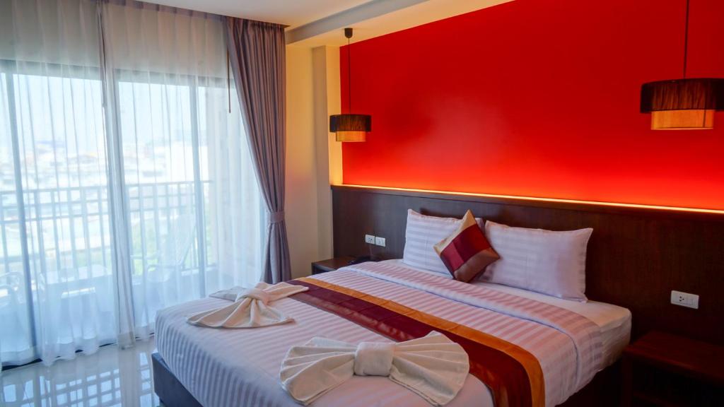 Postel nebo postele na pokoji v ubytování VISA Hotel Hua Hin - SHA Plus