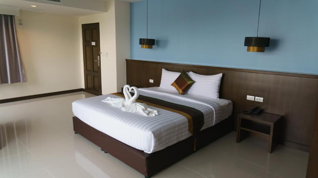 Postel nebo postele na pokoji v ubytování VISA Hotel Hua Hin - SHA Plus