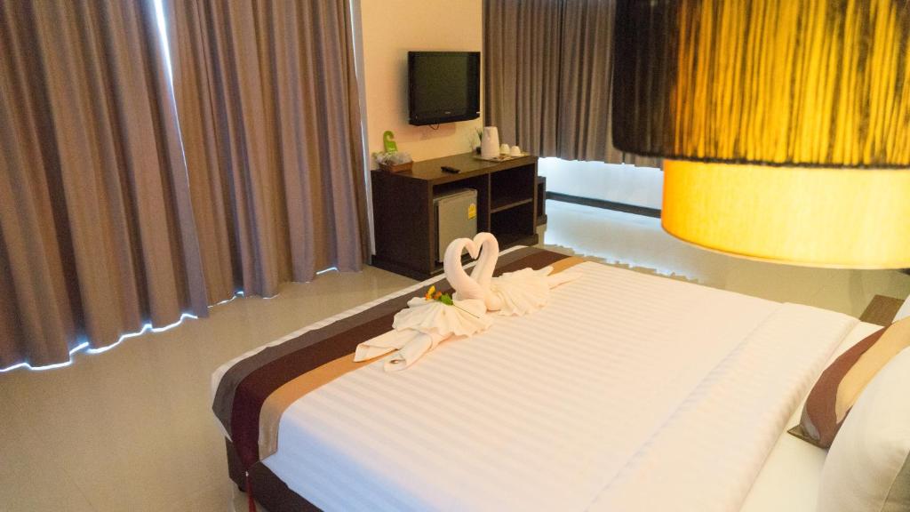 Postel nebo postele na pokoji v ubytování VISA Hotel Hua Hin - SHA Plus