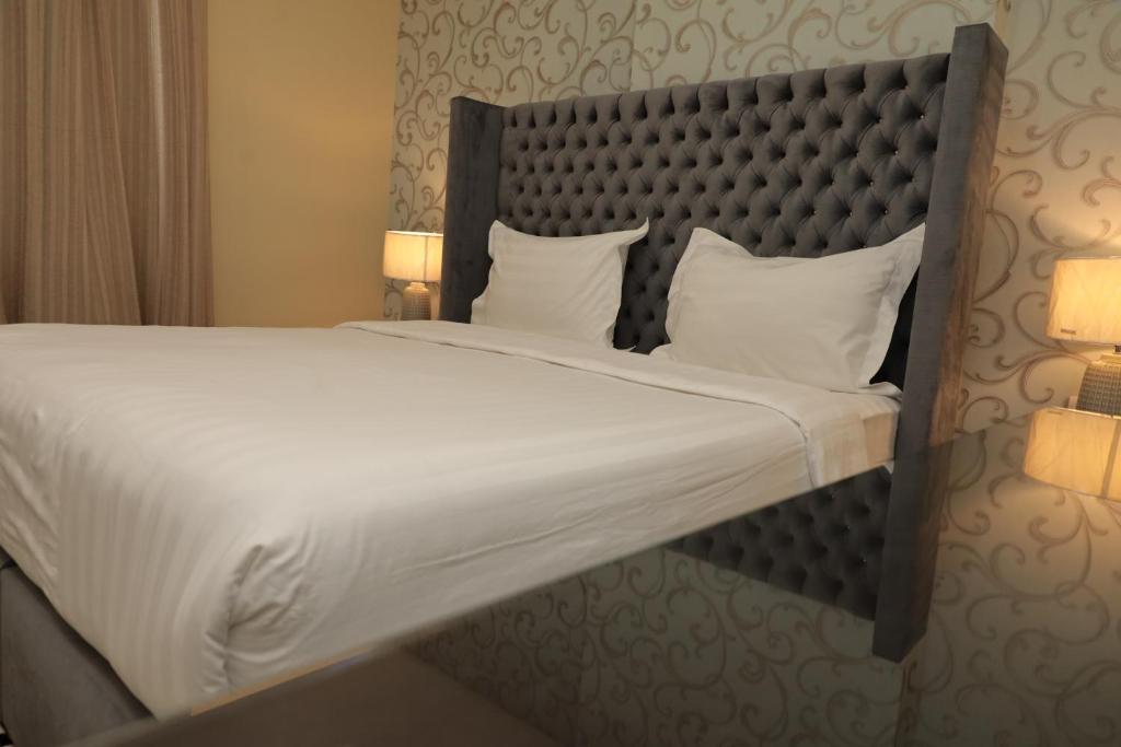 Letto o letti in una camera di Rayan Residence