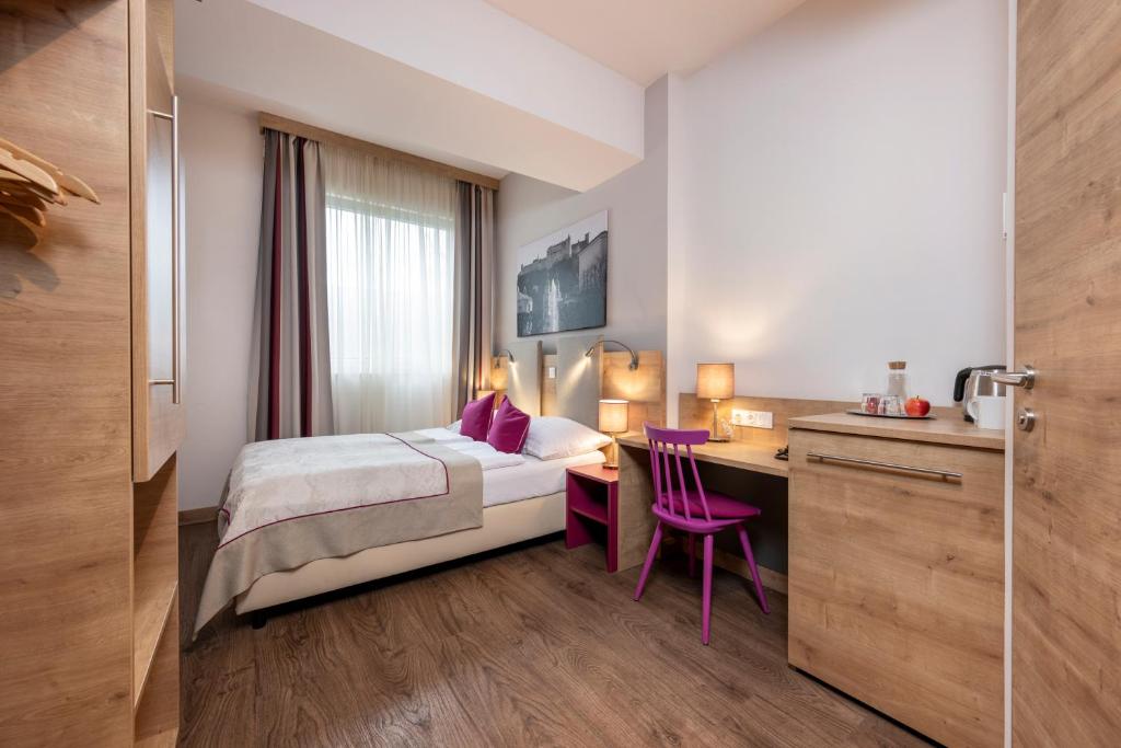 Posteľ alebo postele v izbe v ubytovaní HOTEL junior by MAX 70