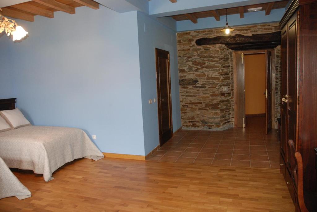 Postel nebo postele na pokoji v ubytování La Casona de Amaido