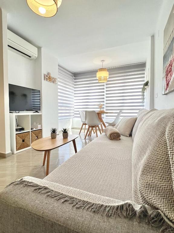 TV a/nebo společenská místnost v ubytování Apartamento Turistico Peñalver Playa 316