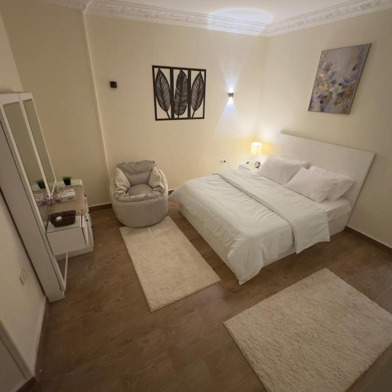 Postel nebo postele na pokoji v ubytování Hotel Apartment In Sheikh Zayed With Private Entrance