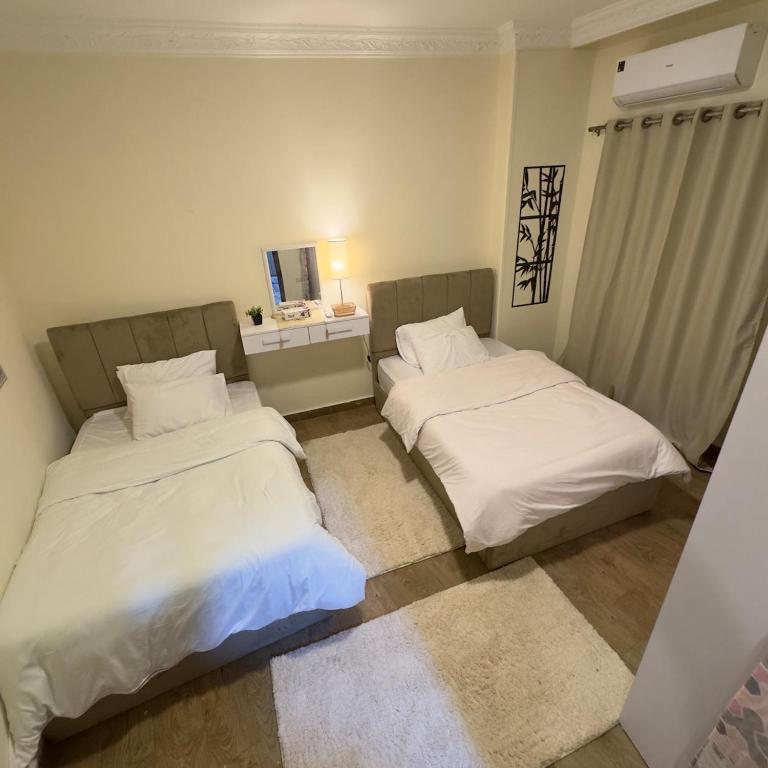 Postel nebo postele na pokoji v ubytování Hotel Apartment In Sheikh Zayed With Private Entrance
