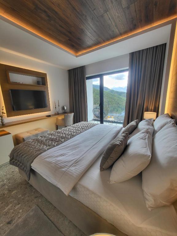 Postel nebo postele na pokoji v ubytování Apartmani Tarsko Jezero
