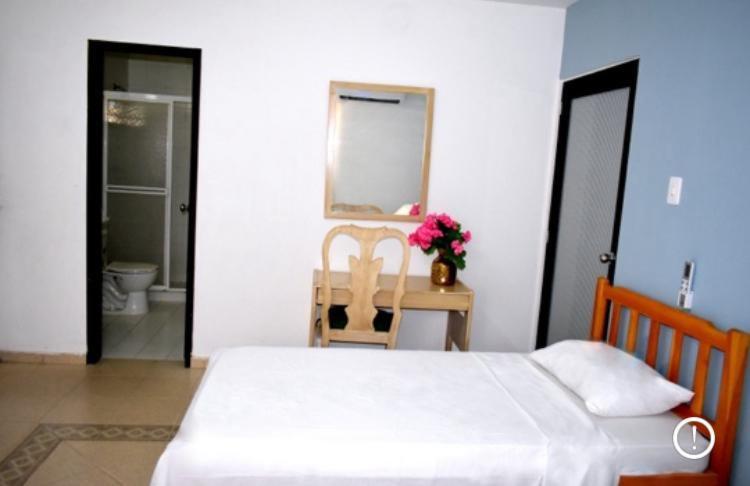 Letto o letti in una camera di Hostal Amanecer del Valle