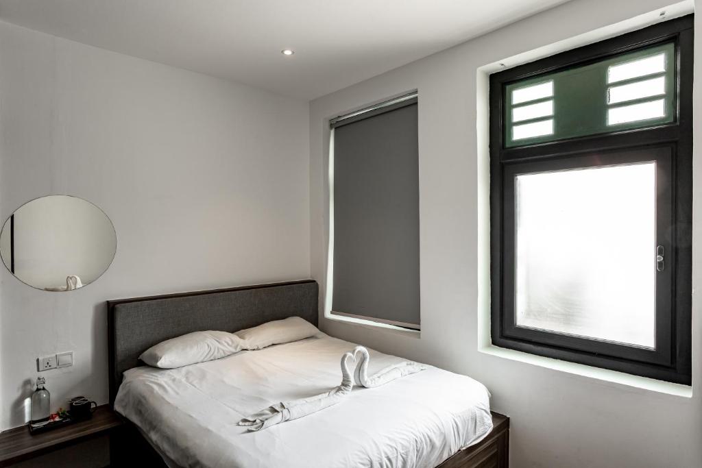 Cama o camas de una habitación en Earnest Hotel Georgetown