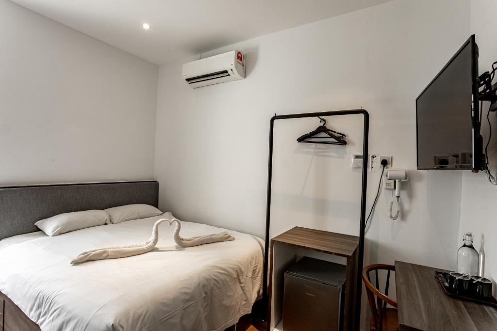 Cama o camas de una habitación en Earnest Hotel Georgetown
