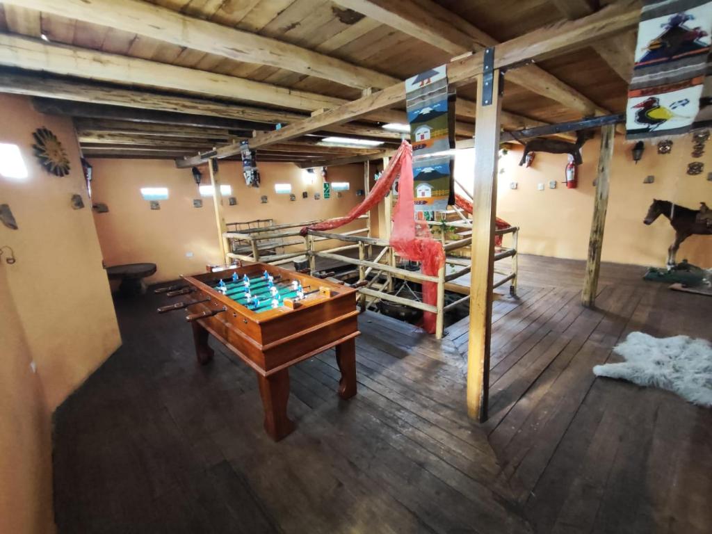 Biliár nebo kulečník v ubytování Hostería Tiopullo