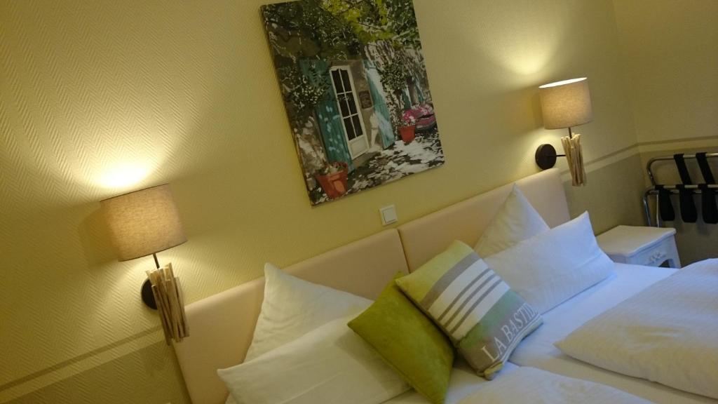 Postel nebo postele na pokoji v ubytování Hotel Villa Verde
