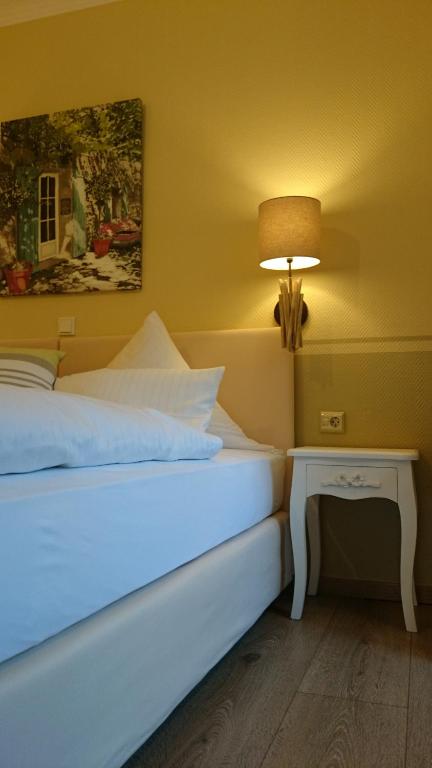 Postel nebo postele na pokoji v ubytování Hotel Villa Verde
