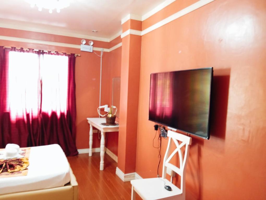 TV a/nebo společenská místnost v ubytování Ladolcevita Inland Resort