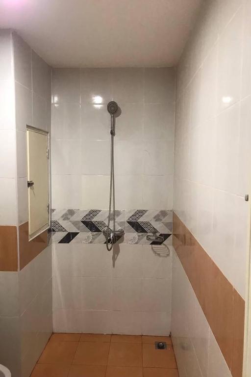 Koupelna v ubytování Praew Mansion