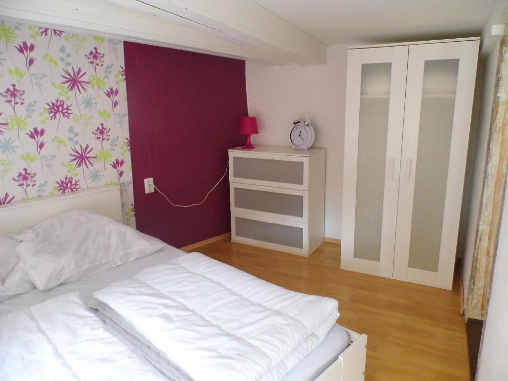 Postel nebo postele na pokoji v ubytování FerienwohnungQuedlinburg