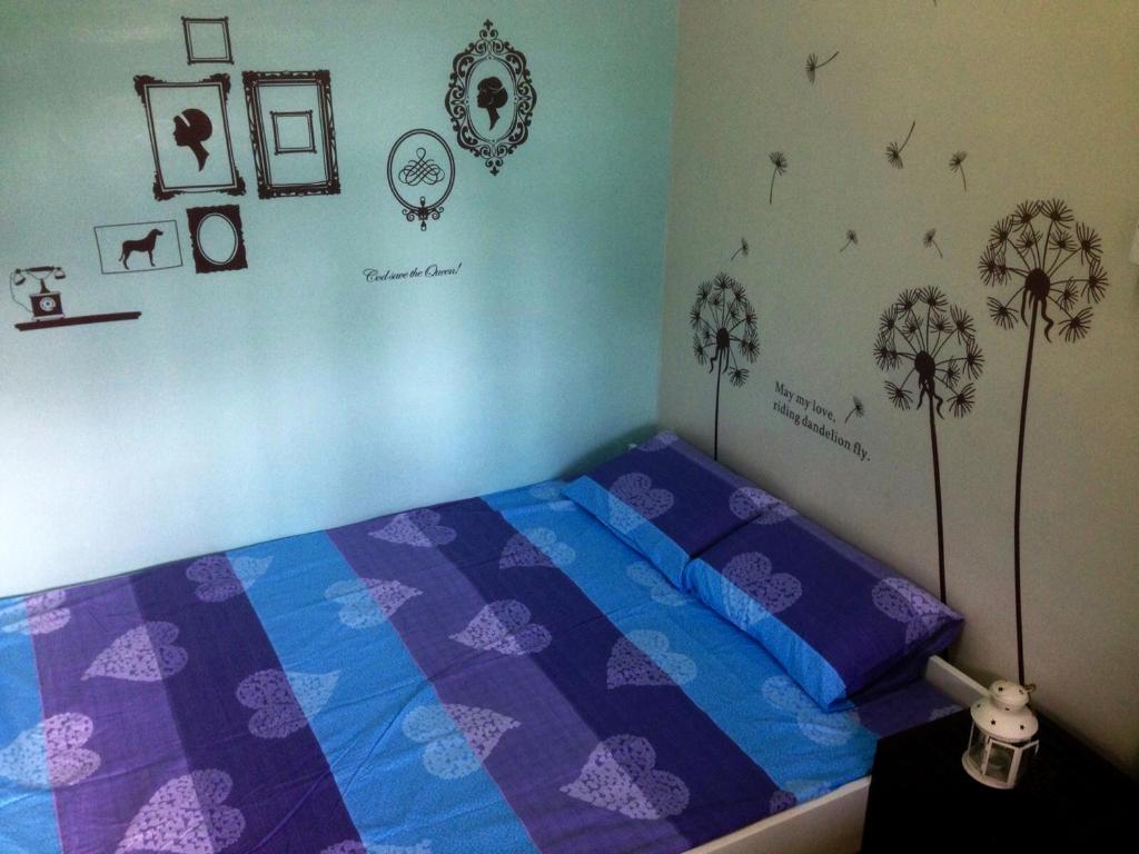Letto o letti in una camera di YHA Ngong Ping SG Davis Youth Hostel