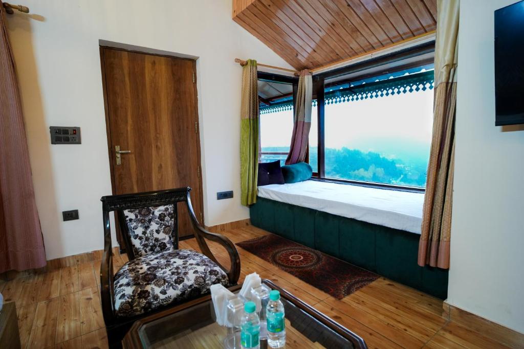 Postel nebo postele na pokoji v ubytování Monal Meadows