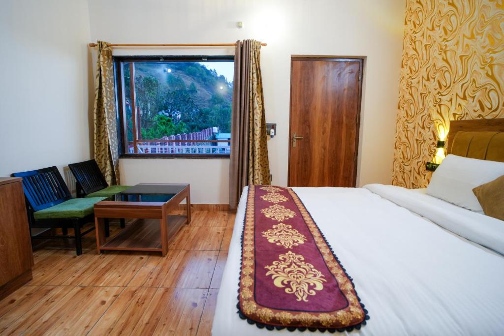 Postel nebo postele na pokoji v ubytování Monal Meadows
