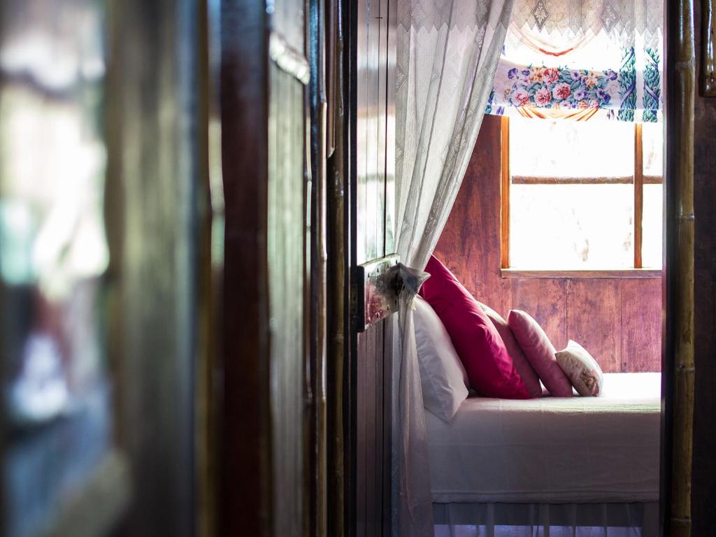 Postel nebo postele na pokoji v ubytování El Septimo Paraiso