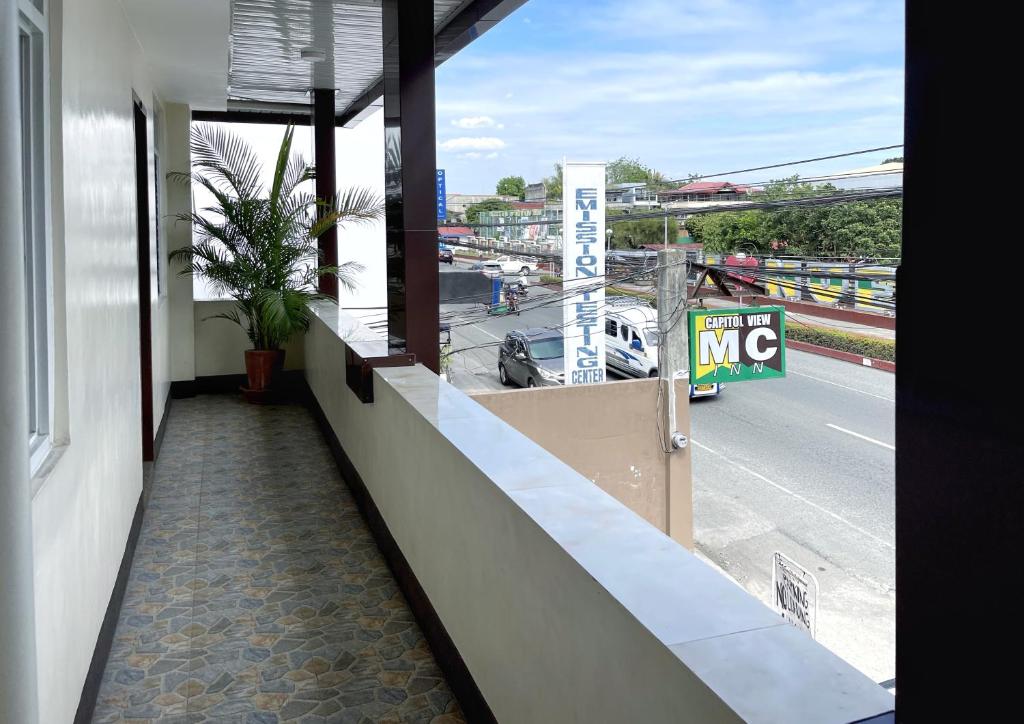 Fotografie z fotogalerie ubytování RedDoorz @ Capitol View MC Inn Nueva Vizacaya v destinaci Bayombong