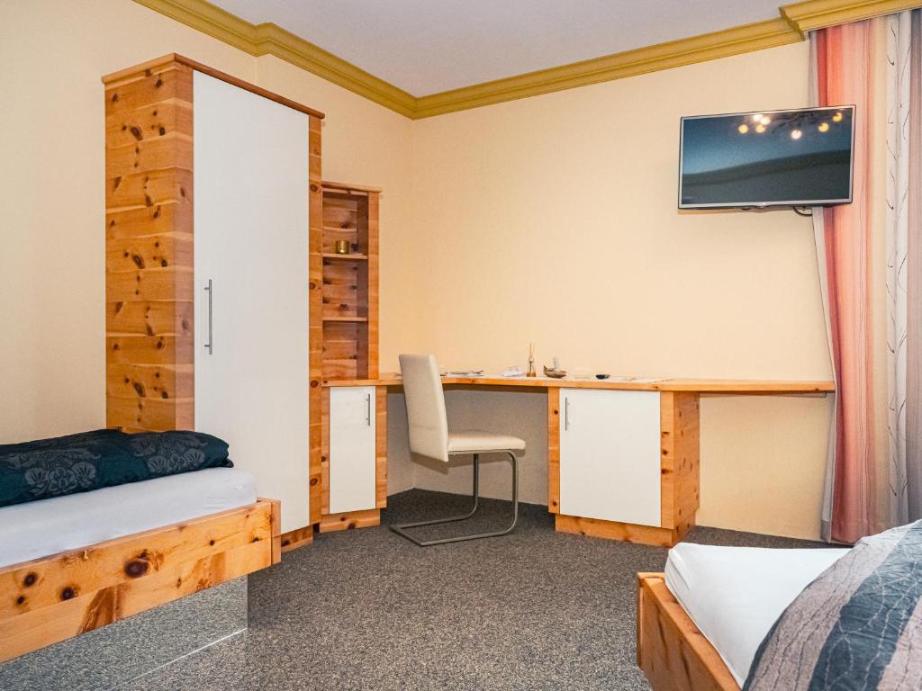 TV a/nebo společenská místnost v ubytování Zirben Diamant Rooms & Dogs