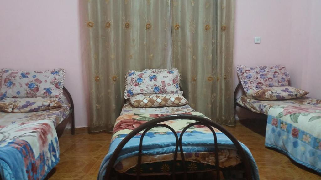 Postel nebo postele na pokoji v ubytování Sami Hostel
