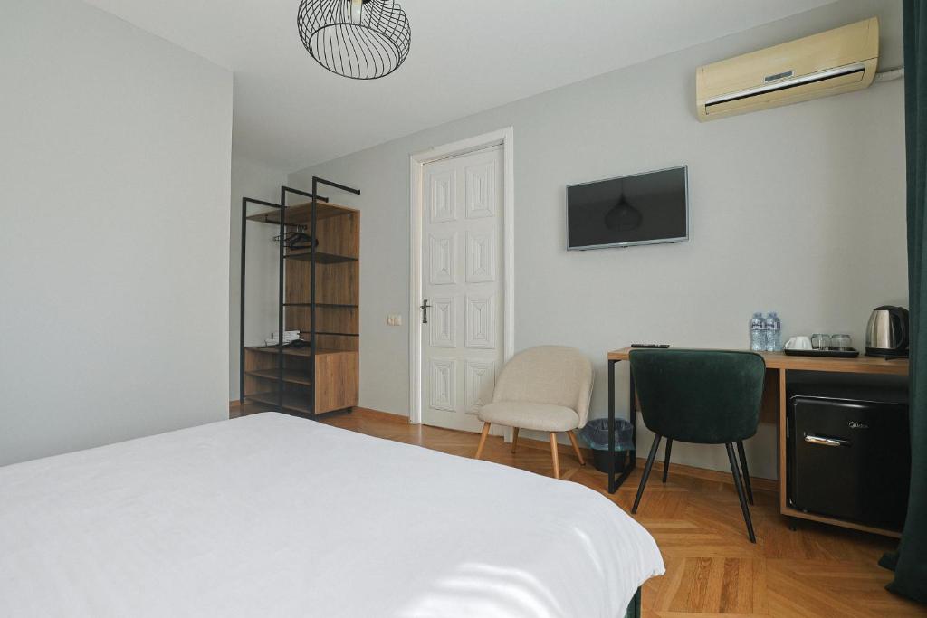 Postel nebo postele na pokoji v ubytování Hotel White House
