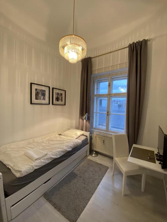 Postel nebo postele na pokoji v ubytování SEEBLICKAPARTMENT BUSINESS Im Zentrum
