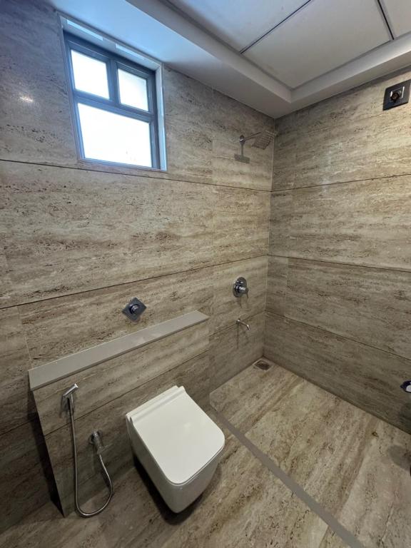 Koupelna v ubytování Adarsh Hotel