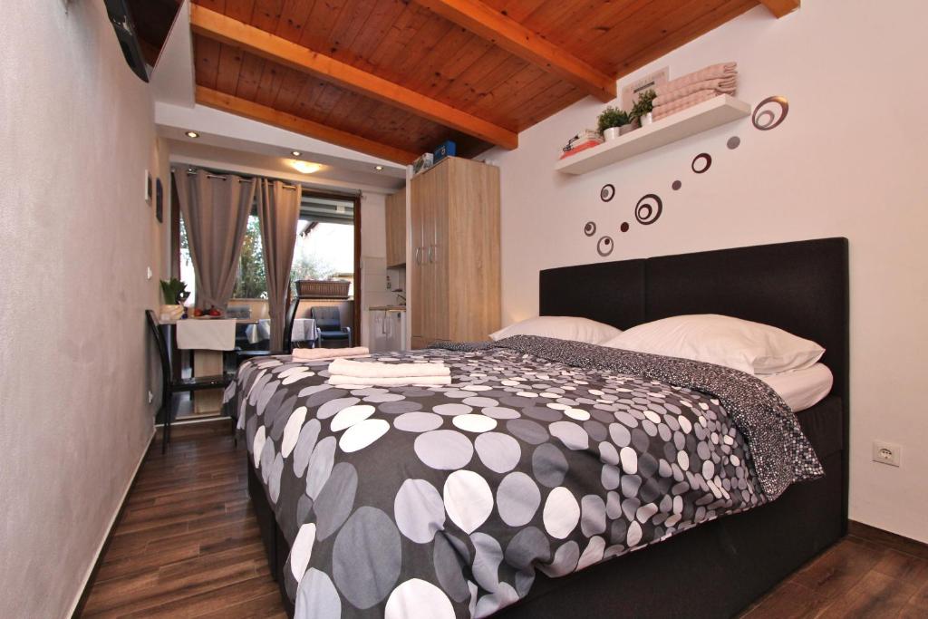 Postel nebo postele na pokoji v ubytování Apartment Tomi