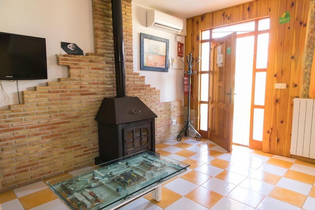 TV a/nebo společenská místnost v ubytování Casa Mistral - Complejo Rural Los Cuatro Vientos