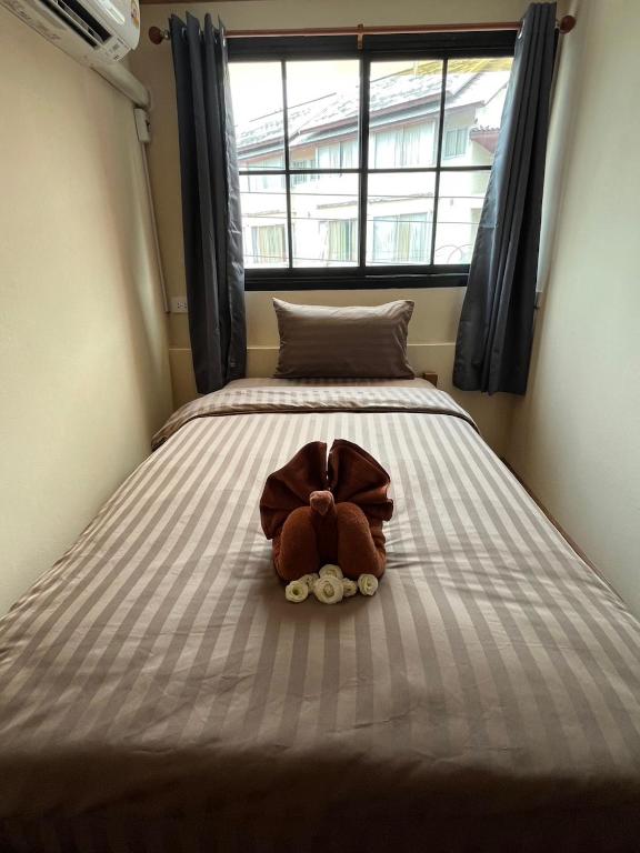 Postel nebo postele na pokoji v ubytování Tian Ming Hostel