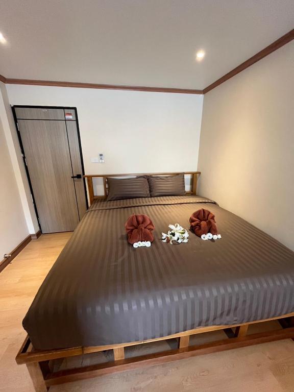 Postel nebo postele na pokoji v ubytování Tian Ming Hostel
