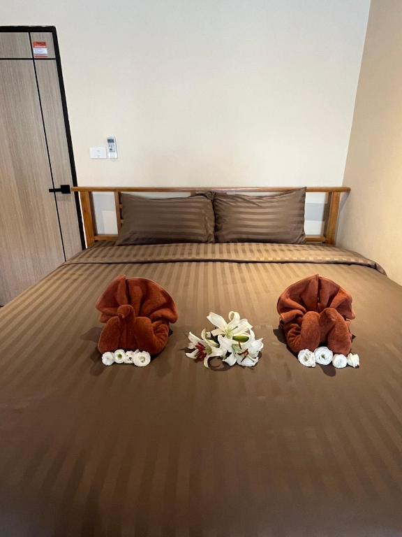 Postel nebo postele na pokoji v ubytování Tian Ming Hostel