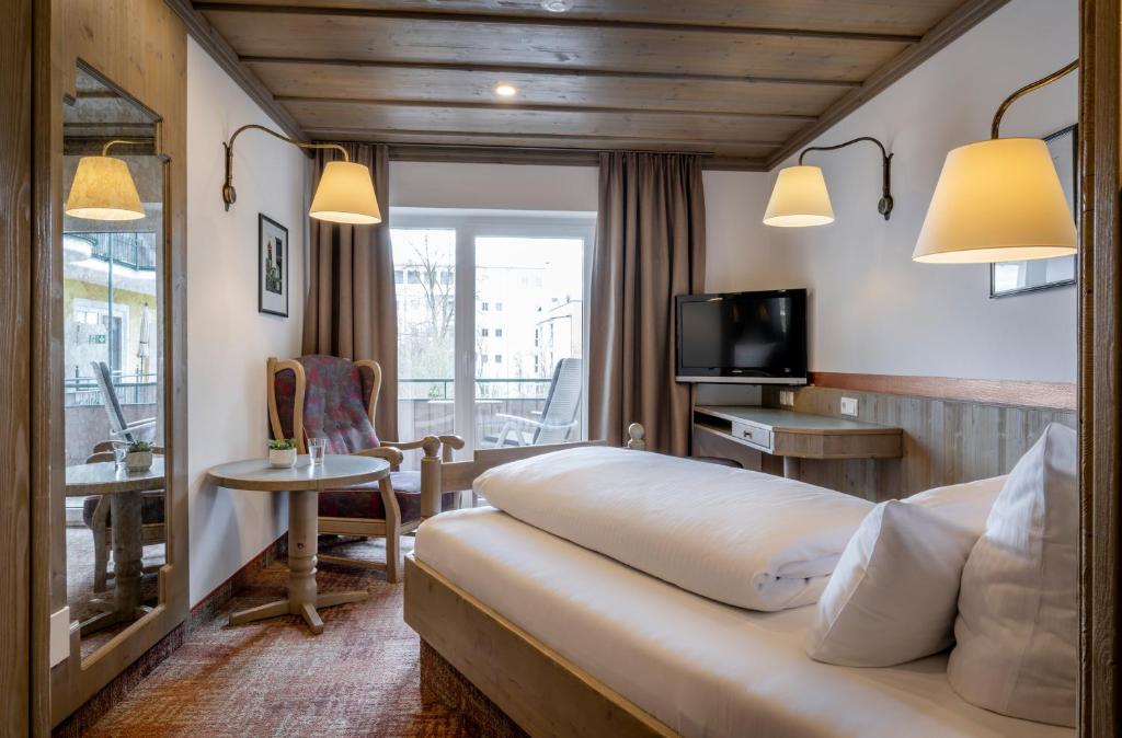 TV a/nebo společenská místnost v ubytování Hotel Promenade