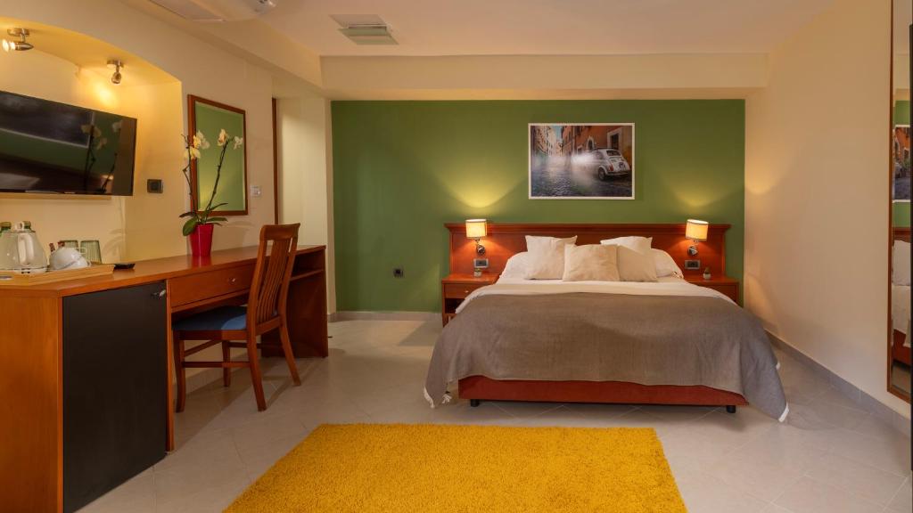 Postel nebo postele na pokoji v ubytování B&B Ciao Bella
