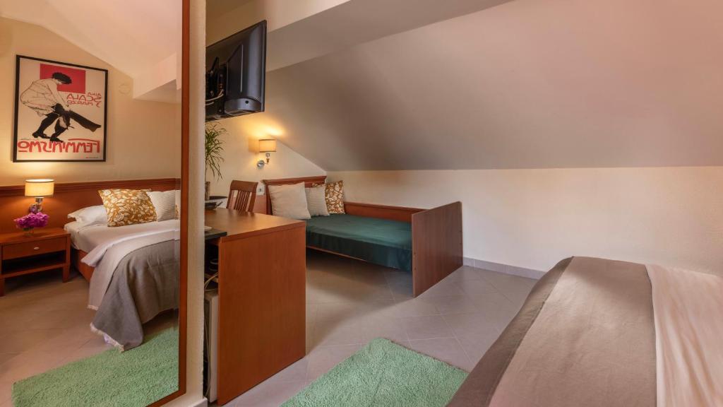 Postel nebo postele na pokoji v ubytování B&B Ciao Bella