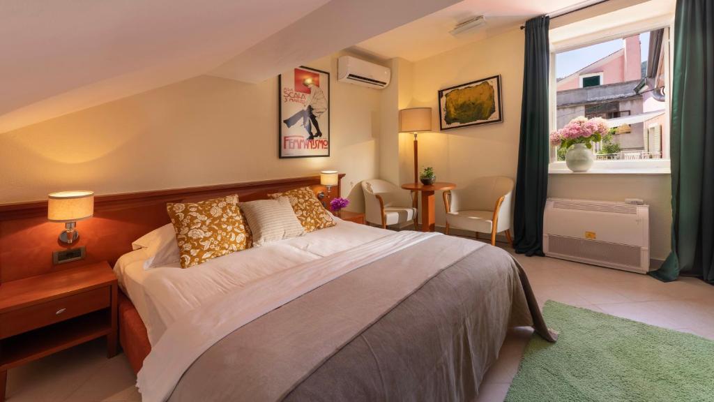 Postel nebo postele na pokoji v ubytování B&B Ciao Bella
