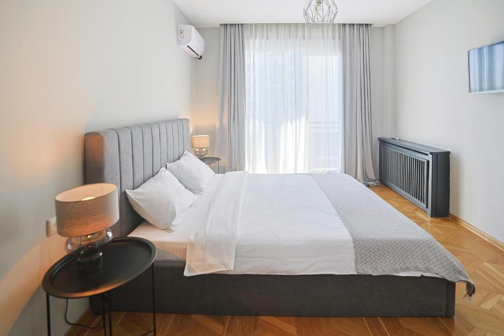 Postel nebo postele na pokoji v ubytování Hotel White House