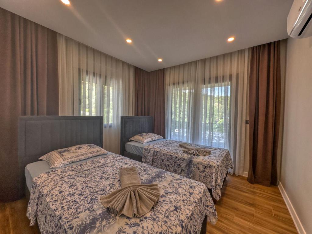 Katil atau katil-katil dalam bilik di Villa Bitirmiş 1