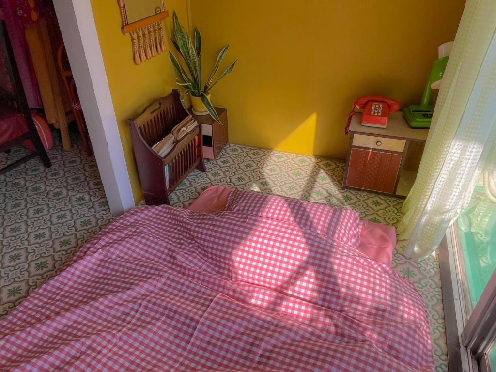 Postel nebo postele na pokoji v ubytování Showa Retro