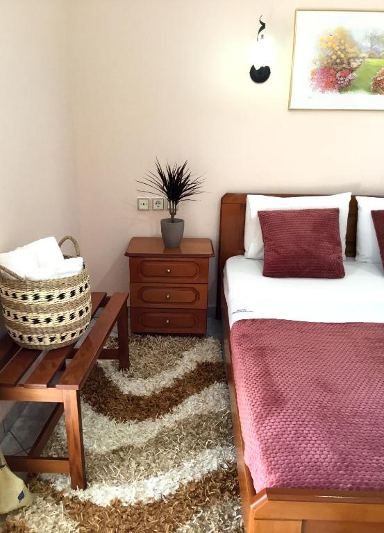 Postel nebo postele na pokoji v ubytování Hotel Triantafyllou