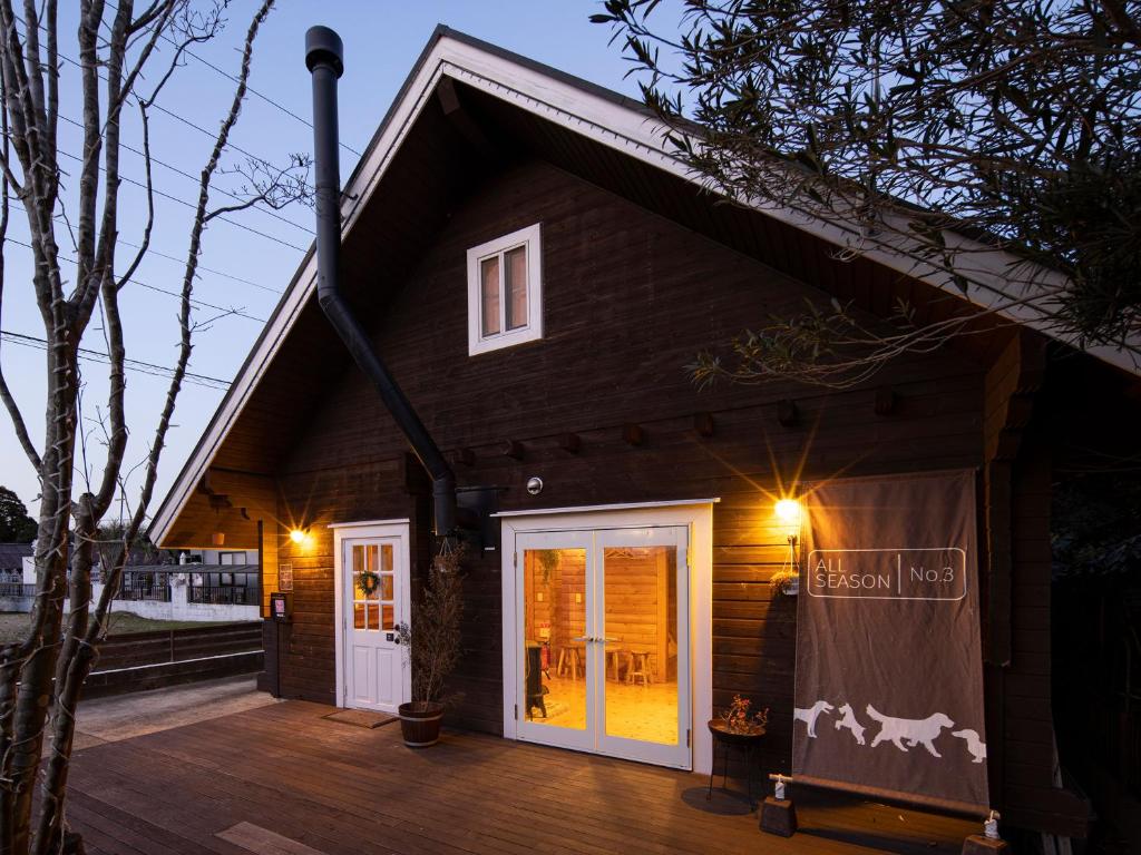 a house with a porch with a horse on it at ALL SEASON RESORT No3 Kino Nukumori in Jōnouchi