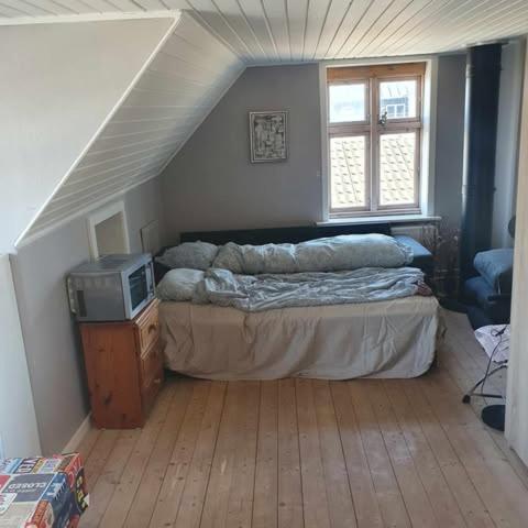 Postel nebo postele na pokoji v ubytování Rundvejen Guest House