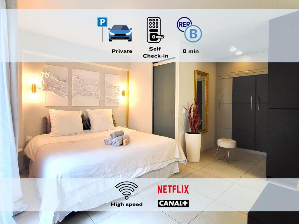 Postel nebo postele na pokoji v ubytování La Parisienne - Spacieux studio avec parking privé