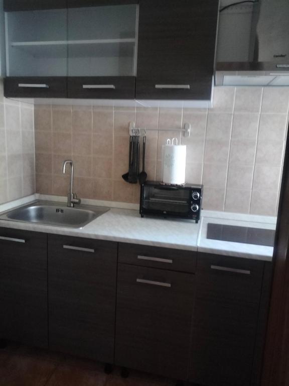 Kuchyň nebo kuchyňský kout v ubytování SIM residence