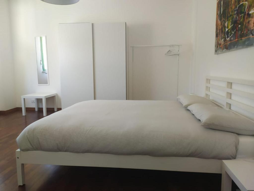 Postel nebo postele na pokoji v ubytování Fontana Apartment 2
